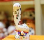 招财猫左手招什么右手招什么意思